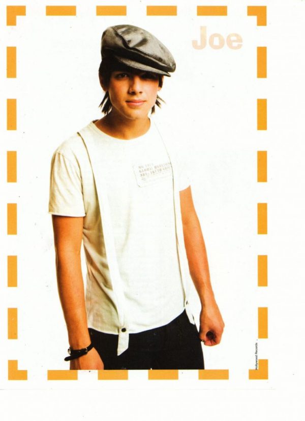 Joe Jonas white t-shirt grey hat