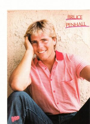 Bruce Penhall pink shirt sitting down open legs Bop