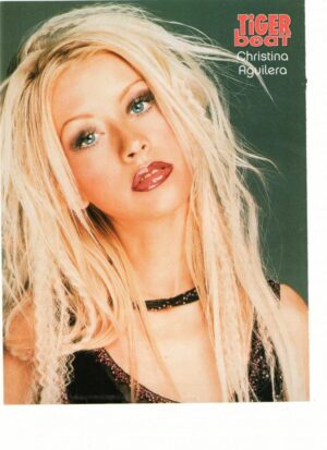 Christina Aguilera windy hair black shirt close up Tiger Beat