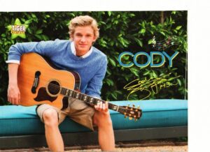 Cody Simpson open legs guitar Tiger Beat