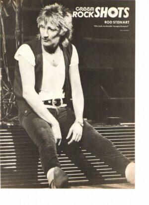 Rod Stewart sitting on stage Rock Shots Cream