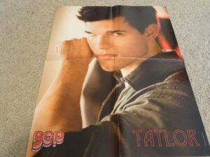 Taylor Lautner brown shirt thinking Twilight teen stars forever pinups