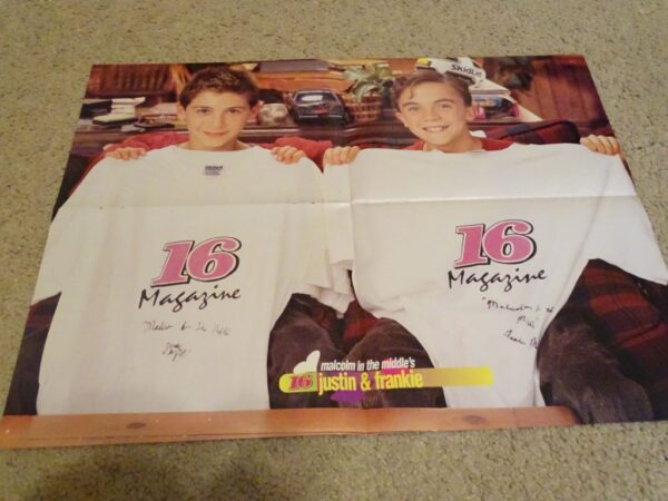 Frankie Muniz Justin Long holding 16 t-shirts autographed