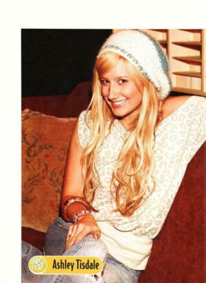 Ashley Tisdale sitting couch
