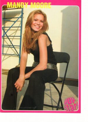 Mandy Moore teen magazine pinup black pants in a black chair Pop Star