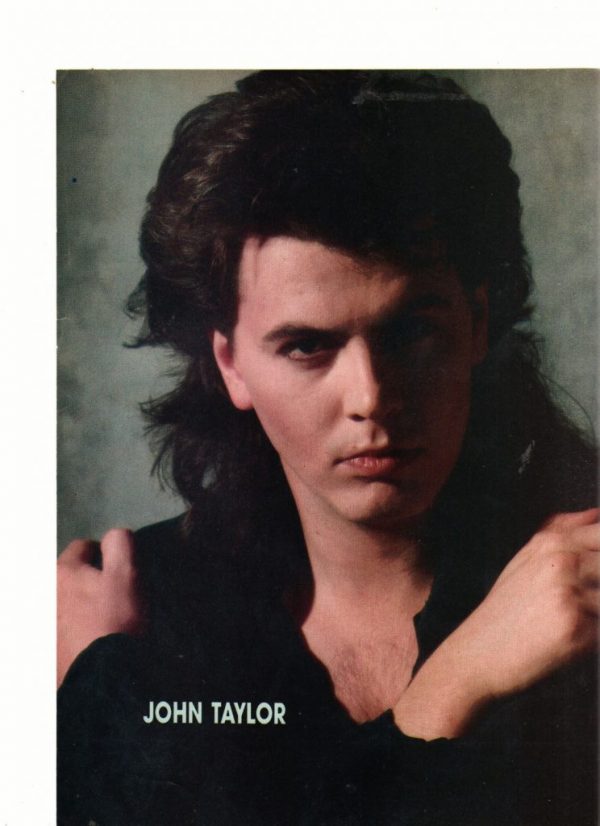 John Taylor crossed arms looks mad Duran Duran