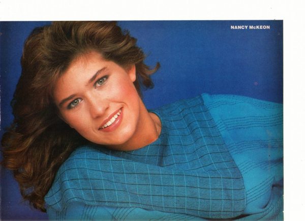 Nancy Mckeon dark blue shirt