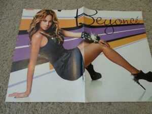 Beyonce black dress Bravo poster floor