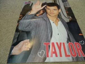 Taylor Lautner waving fans poster