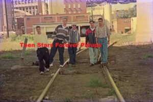 Backstreet Boys Nick Carter Brian Littrell Kevin Richardson walking train tracks photo 1995 BSB DNA tour