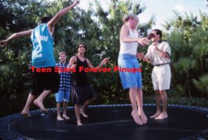 Backstreet Boys barefoot trampoline jumping 1994 boyband jean shorts
