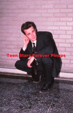 Luke Perry squatting high school suit Beverly Hills 90210