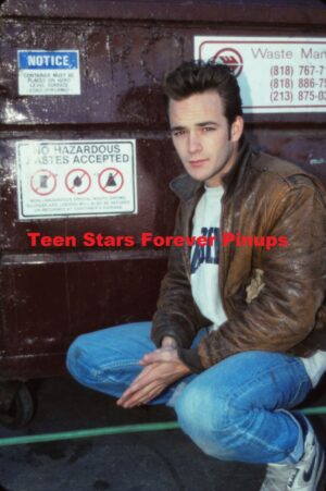 Luke Perry squatting trash dumpster outside jeans Beverly Hills 90210