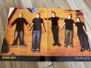 Simple Plan teen magazine poster on a table