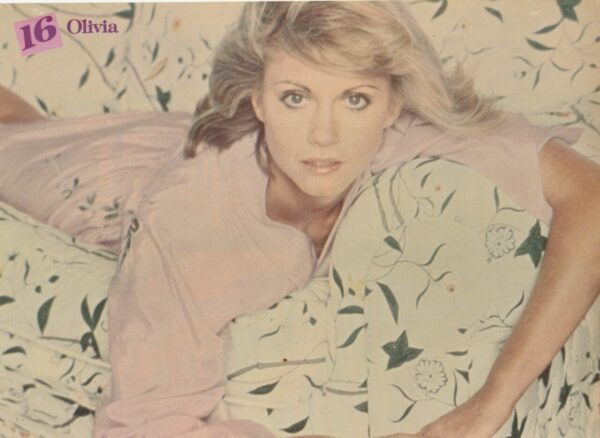 Olivia Newton John KC and the Sunshine Band teen magazine pinup laying down