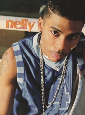 Nelly teen magazine pinup blue sports shirt M