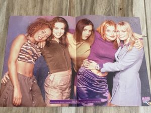 Spice Girls hugs 90's pop band.