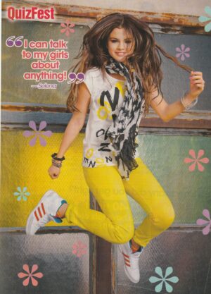 Selena Gomez teen magazine pinup jumping yellow pants Quizfest