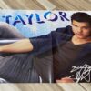 Taylor Lautner Selena Gomez teen magazine poster laying down M sexy pose