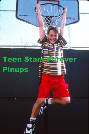 Zachery Ty Bryan photo vintage Home Improvement set hanging on basketball goal red shorts