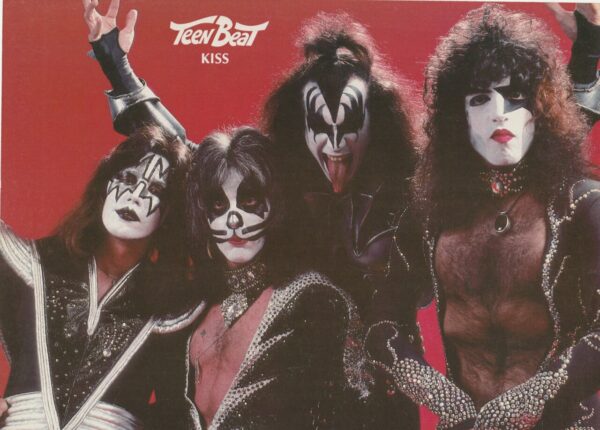 Kiss rock band 70's makeup costumes posing modeling