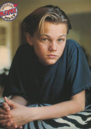 Leonardo Dicaprio teen magazine pinup young boy modeling zebra couch Tutti Frutti blue shirt