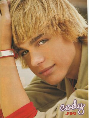 Cody Linley teen magazine pinup clipping hands on face lips bright eyes Pix