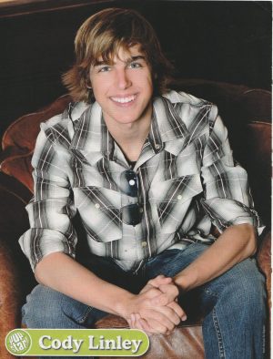 Cody Linley teen magazine pinup clipping jeans brown chair young boy teen idols Pop Star