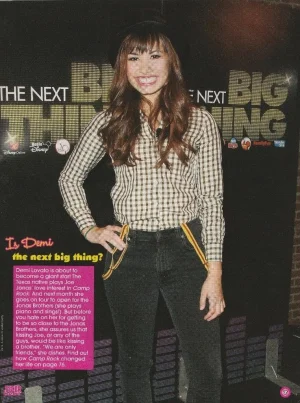 Miley Cyrus Demi Lovato teen magazine pinup clipping black jeans cell phone pix