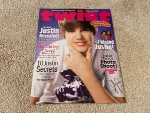 Justin Bieber teen magazine pinup clipping squatting Twist magazine modeling pix